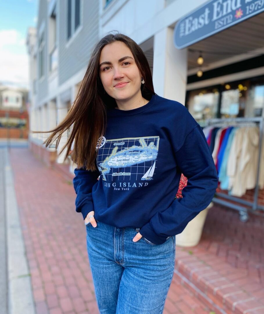 A Young Woman Posing in Long Island Tee Image